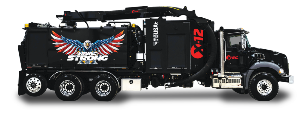 Black X-Vac hydro excavation vacuum truck with eagle-wing mural, X-12 branding and large suction hose